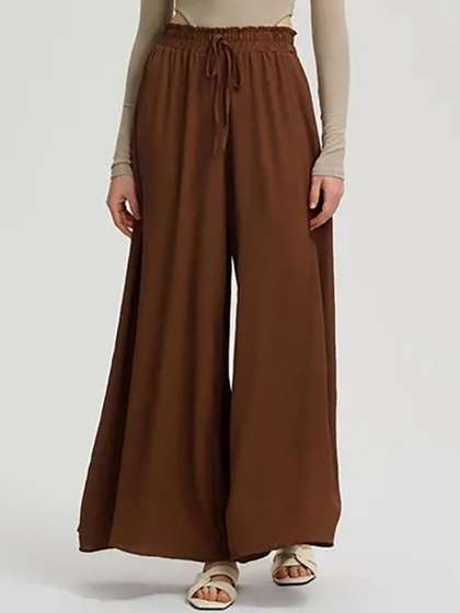Kotty Women
                        High-Rise Easy Wash Loose-Fit Pleated Wide Leg
                        Trousers