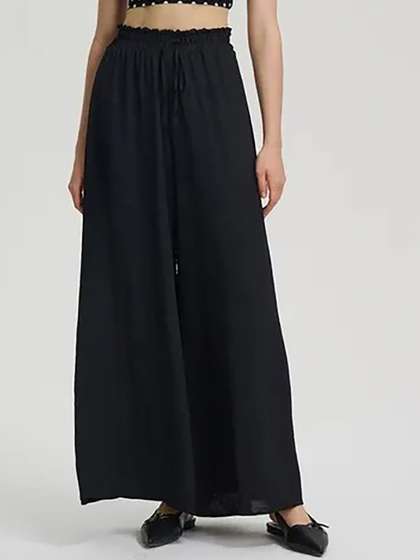 Kotty Women
                        High-Rise Easy Wash Pleated Loose Fit Wide Leg
                        Trousers