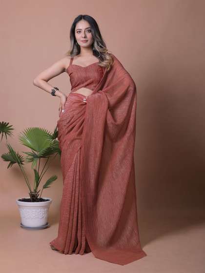 Anneca Shimmer
                        Crunchy Tissue Party wear Saree