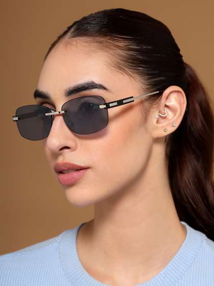 Voyage Unisex
                        Rimless Sunglasses with UV Protected Lens
                        4097MG7378