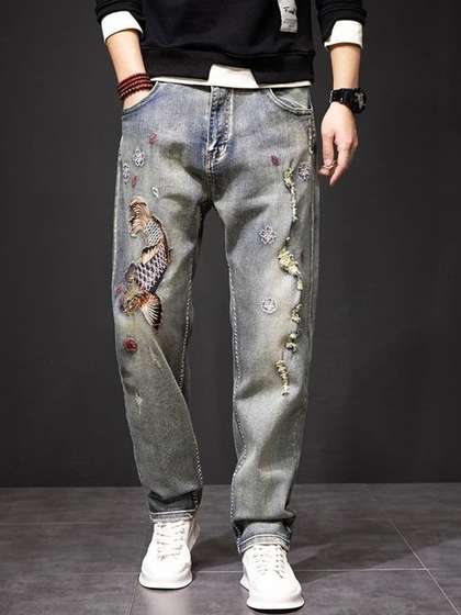 StyleCast x
                          Revolte Men Relaxed Fit Mid-Rise Light Fade
                          Applique Jeans