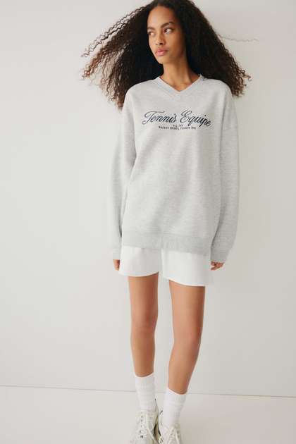 H&M Oversized
                        V-Neck Sweatshirt