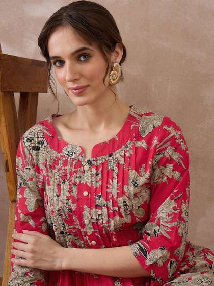 Indo Era Women
                          Floral Printed Pleated Pure Cotton Kurta with
                          Trousers