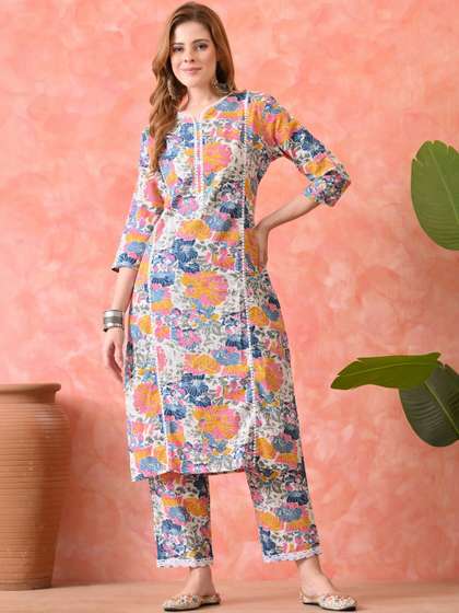 DEEPYOG APPAREL
                        Women Floral Printed Regular Thread Work Pure
                        Cotton Kurta with Trousers