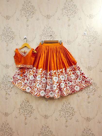 Sangria Girls
                    Embroidered V-Neck Flared Lehenga Choli With
                    Dupatta