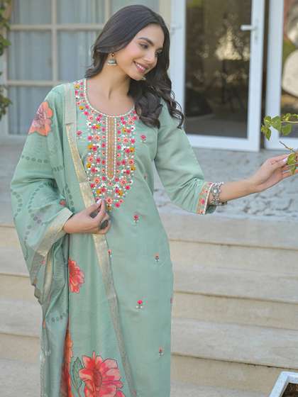 SANISA Women Floral
                        Embroidered Regular Thread Work Kurta with
                        Trousers & With Dupatta