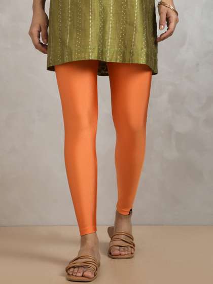 TWIN BIRDS Women
                          Orange Solid Shimmer Leggings