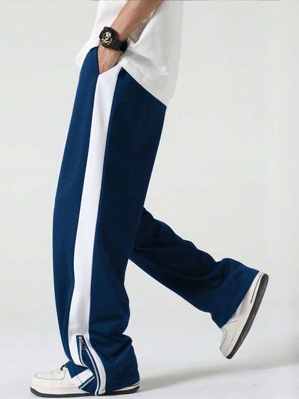 JUMPCUTS Men Mid
                        Rise Baggy Fit Track Pants