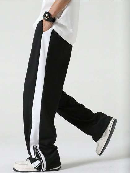 JUMPCUTS Men Mid Rise
                      Colorblocked Baggy Fit Track Pants
