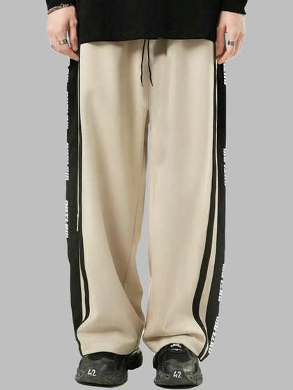 JUMPCUTS Men Mid
                        Rise Colourblocked Baggy Fit Track Pants