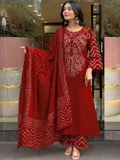 Aaghnya Women Ethnic
                        Motifs Printed Regular Kurta with Trousers &
                        With Dupatta