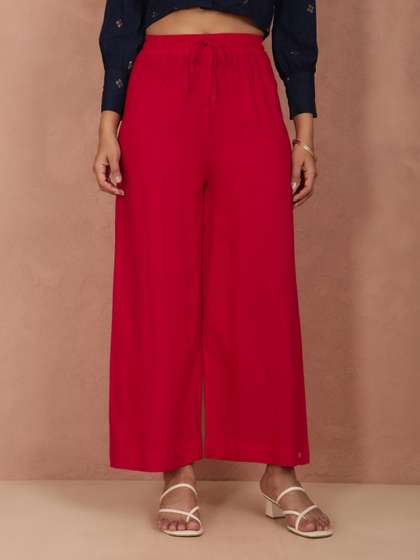 TWIN BIRDS Women
                          Red Solid Wide Leg Palazzos
