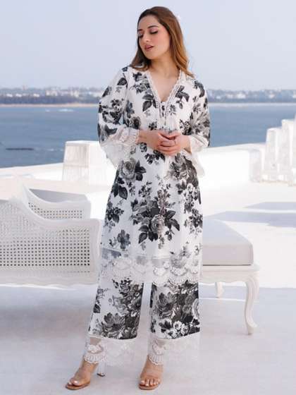 Royal Export Women
                        Floral Printed Kurta with Trouser