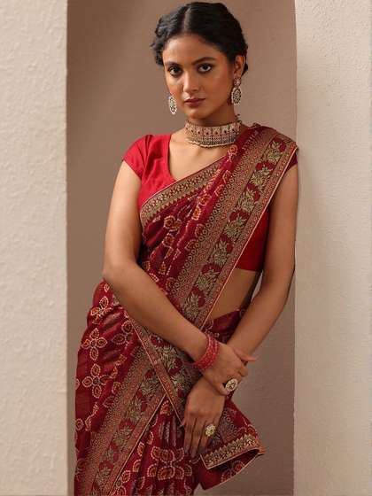 Libas Maroon
                        Bandhani Printed Georgette Saree With Unstitched
                        Blouse Piece