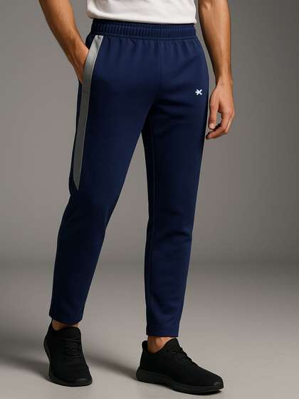 HRX by Hrithik
                        Roshan Men Regular Fit Mid-Rise Track Pant