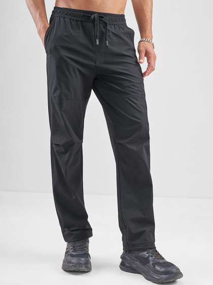 HIGHLANDER Men Solid
                        Super Stretch Mid-Rise Relaxed Fit Parachute
                        Trousers