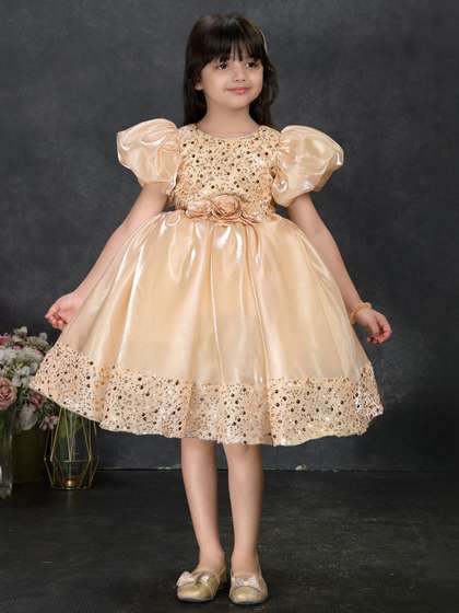 Lagorii Girls Sequin
                      Party Wear Frock with Puffy Sleeves and Floral
                      Waist Detail Gold