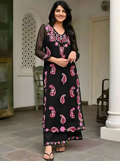 Maeswag Women
                        Embroidered Regular Thread Work Kurta with
                        Trousers