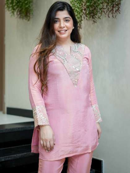 KALINI Women Floral
                      Embroidered Regular Thread Work Kurta with
                      Trousers