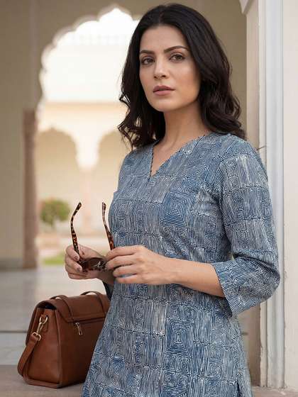 Saanjh Women Printed
                        Regular Pure Cotton Kurta with Trousers