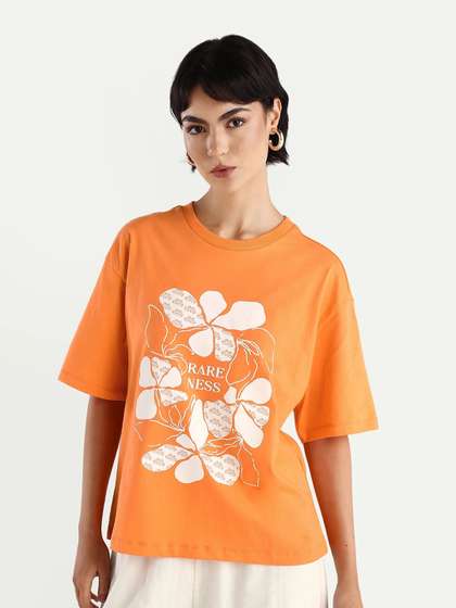 RAREISM Women Orange
                        Graphic Print Oversized Fit Half Sleeve Crew
                        Neck T-Shirt