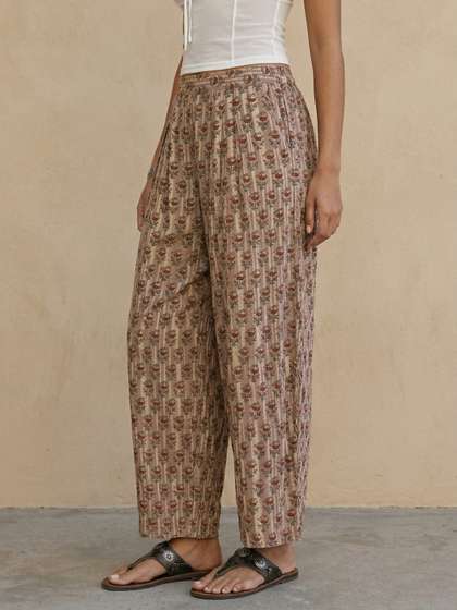 fusion by glitchez
                        Women Ethnic Motifs Printed Straight Fit Pleated
                        Trousers