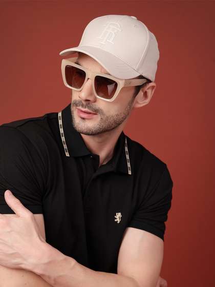 Red Tape Unisex
                    Off-White Solid Polyester Logo Baseball Cap with
                    Adjustable Back Strap