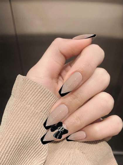 Vembley Set Of 24
                        Artificial Reusable Press On Nails - Black Tips
                        With Bow Design