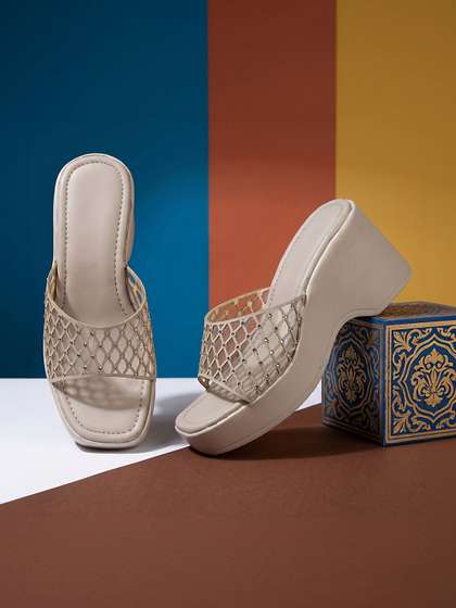 Ishransh Textured PU
                      Party Wedge Mules