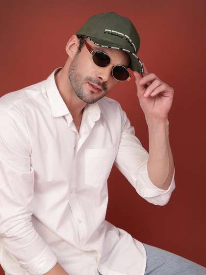 Red Tape Unisex Green
                    Solid Cotton Twill Baseball Cap with Adjustable
                    Strap