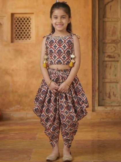 Sangria Girls Printed
                    Tie-Up Neck Top & Dhoti Pants
