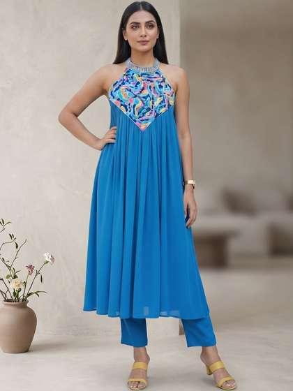 Varanga Women
                        Printed Empire Thread Work Silk Georgette Kurta
                        with Trousers