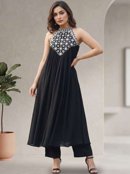 Varanga Women Ethnic
                        Motifs Embroidered Regular Thread Work Kurta
                        with Trousers