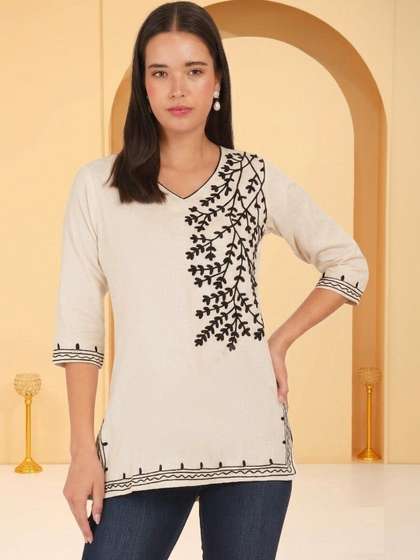 Anouk Rustic Ethnic
                        Motifs Embroidered V-Neck Thread Work Pure
                        Cotton Blend Thread Work Kurti