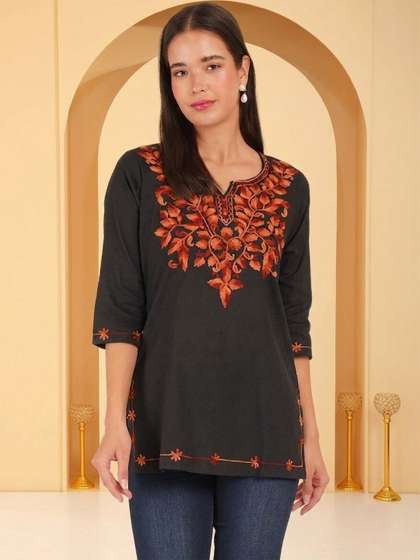 Anouk Rustic Ethnic
                        Motifs Embroidered V-Neck Thread Work Pure
                        Cotton Thread Work Kurti