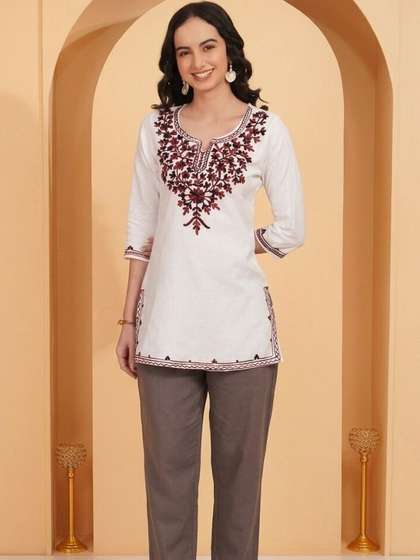 Anouk Rustic Ethnic
                        Motifs Embroidered V-Neck Thread Work Pure
                        Cotton Blend Thread Work Kurti