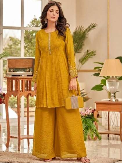 Varanga Women Ethnic
                        Motifs Embroidered Pleated Thread Work Kurti
                        with Palazzos