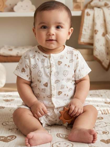 Little Angels Baby Boy
                    Cream Printed Muslin Shirt & Shorts Set