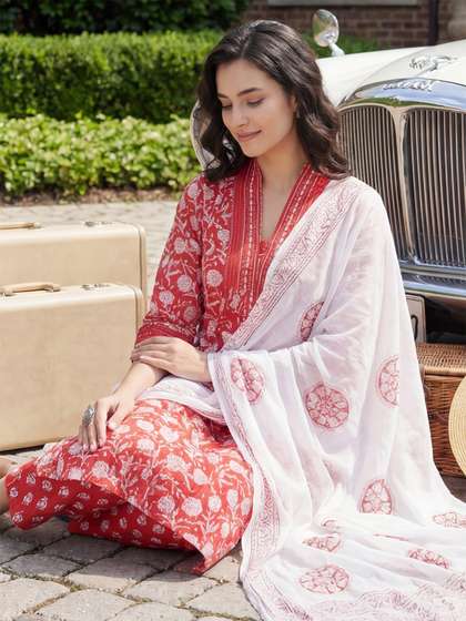 Indo Era Women
                          Floral Printed Pleated Beads and Stones Pure
                          Cotton Kurta with Trousers & With Dupatta