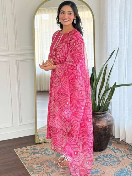 KALINI Women Floral
                        Printed Regular Gotta Patti Kurta with Trousers
                        & With Dupatta