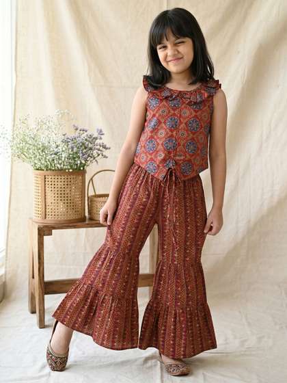 TALES & STORIES
                    Girls Maroon & Black Printed Cotton Top with
                    Sharara Clothing Set
