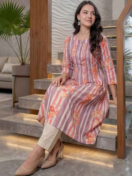 Indo Era Women
                        Printed Regular Beads and Stones Pure Cotton
                        Kurta with Trousers