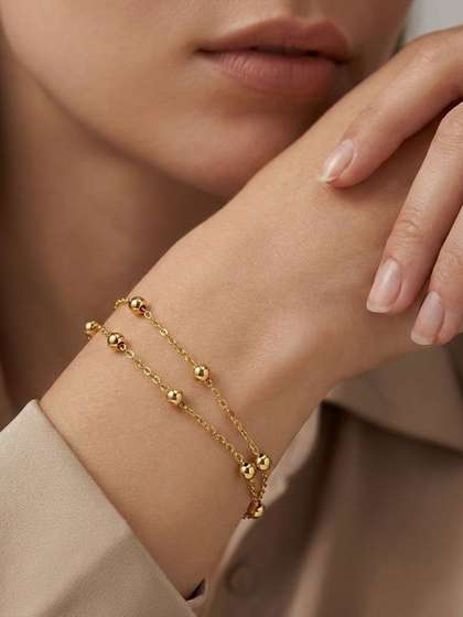 Peora Men Gold-Plated
                    Wraparound Bracelet