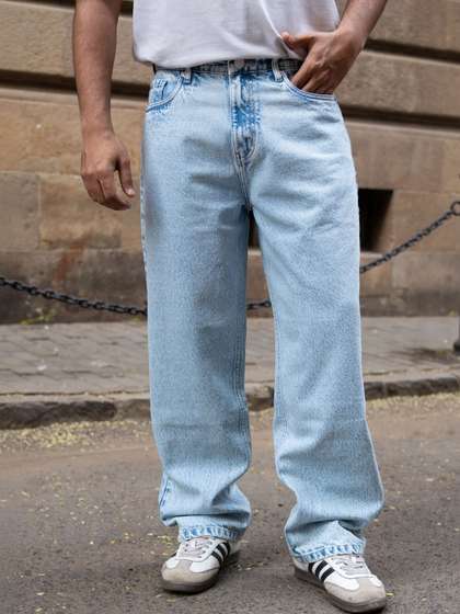 Powerlook Men
                        Relaxed Fit Mid-Rise Mildly Distressed Light
                        Fade Jeans