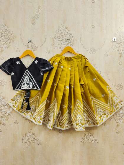 JOVK DESIGN Girls
                    Embroidered Thread Work Tie and Dye Semi-Stitched
                    Lehenga &