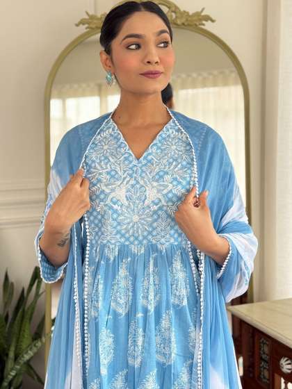 Anouk Women Ethnic
                        Motifs Embroidered Tiered Thread Work Pure
                        Cotton Kurta with Trousers & With Dupatta