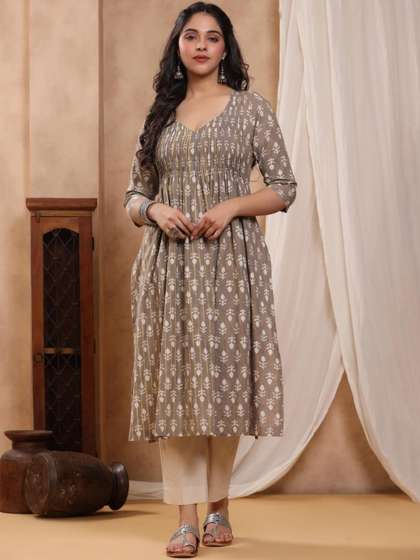 Mayurie Ethnic
                        Motifs Printed V-Neck Pure Cotton Panelled
                        Kurti