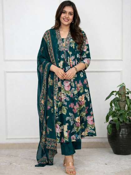 Jikonet Women Floral
                        Printed Regular Thread Work Kurta with Trousers
                        & With Dupatta