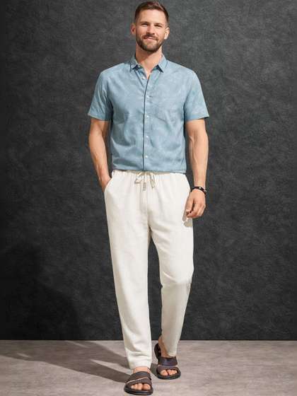 The Roadster
                        Lifestyle Co. Mid Rise Cotton Trousers