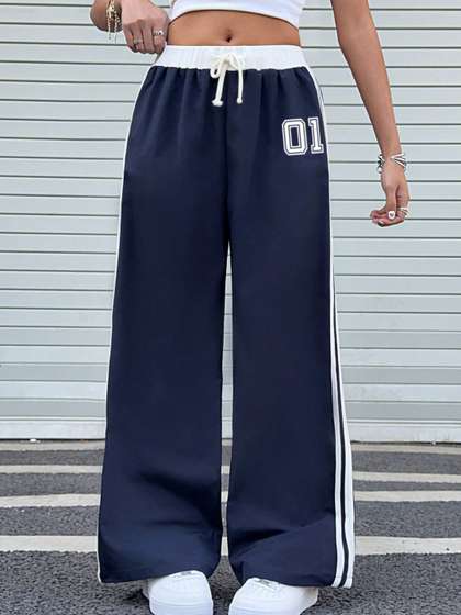 YK Girls Printed Relaxed
                    Loose Fit Trousers